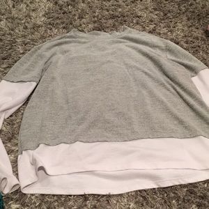 grey shirt with white sleeves